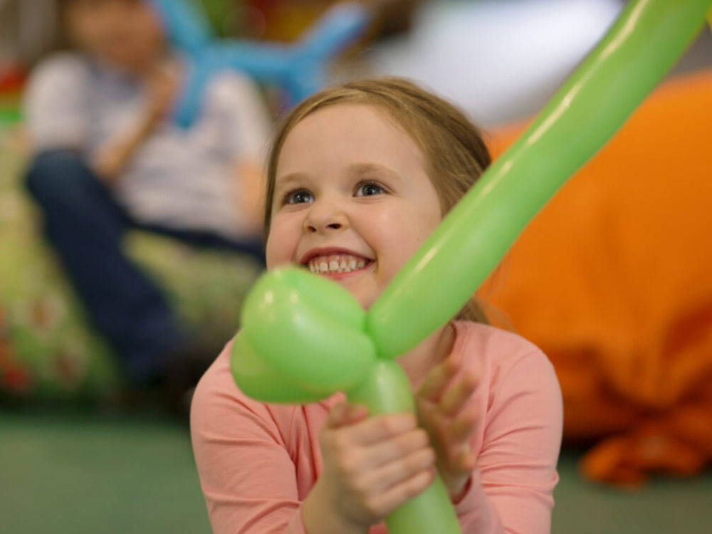 Little girl enjoying entertainment Little girl enjoying entertainment