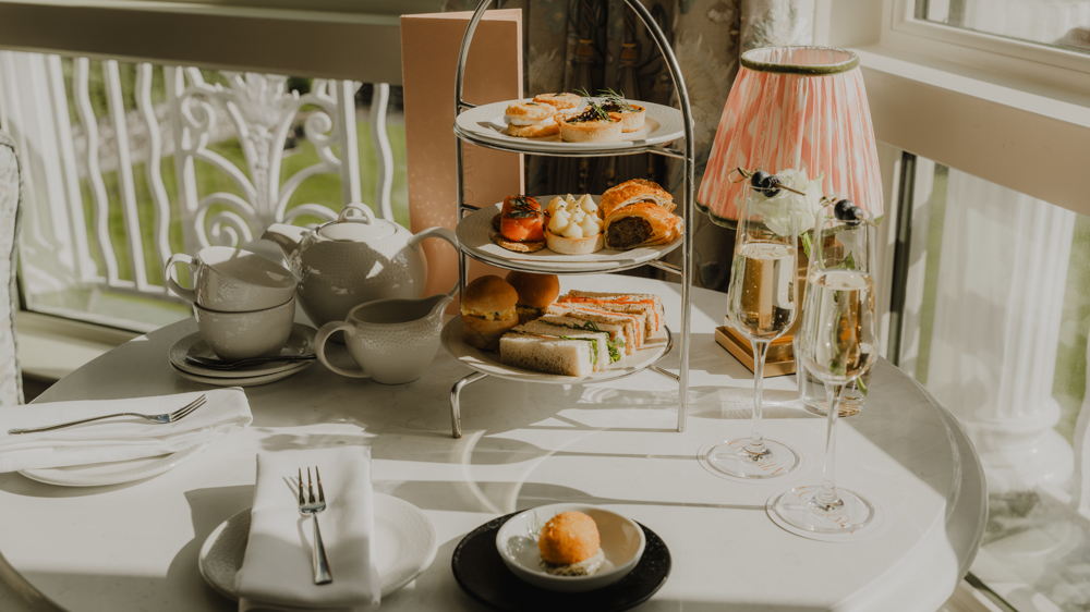 Wide shot of the table with the afternoon tea setting