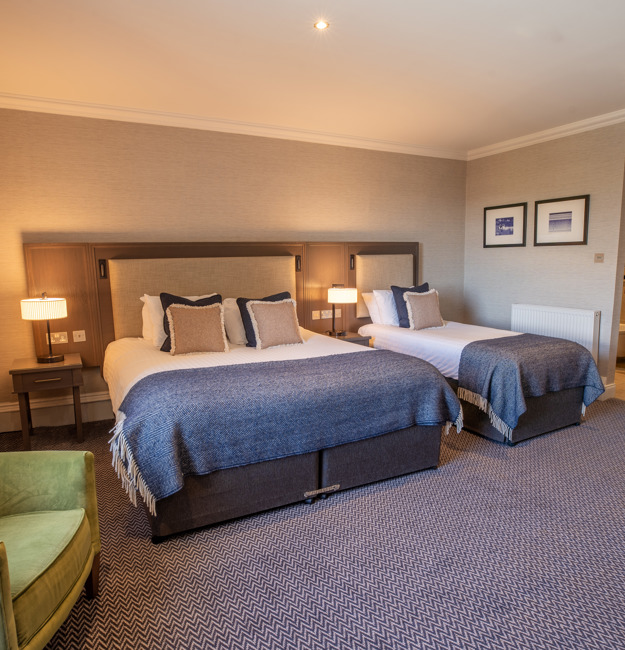 Feature Family Room with a king-sized bed and single bed