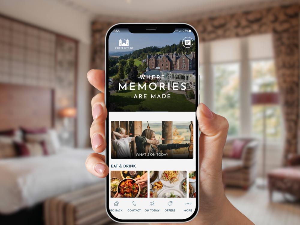 A phone with the Crieff Hydro Family of Apps on it