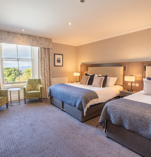 Feature Family Room with a king-sized bed and single bed