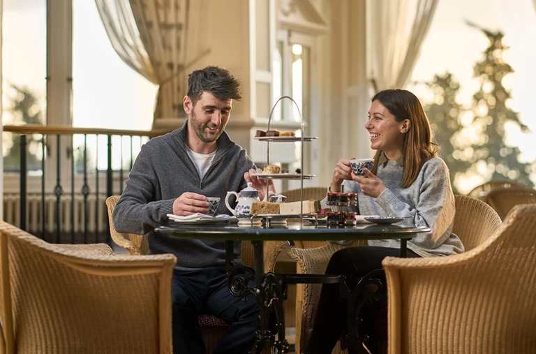 Couple eating afternoon tea